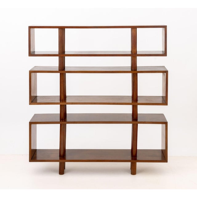 Set of Three Modern Graduated Walnut Modular Shelves, each with central cylindrical supports. Largest: 18.5" H x 46.25" W...