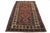 This wool rug features a tribal pattern with beige, blue, and brown accents on a red background inspired by Persian...