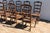 Vintage 1950s Italian Provincial Carved Wood Dining Chairs With Rush Seats – Set of 12 For Sale - Image 11 of 18
