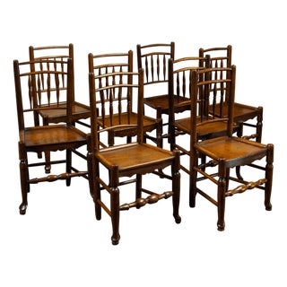 Set of Eight English 1880s Oak Dining Room Side Chairs with Spindle Motifs For Sale