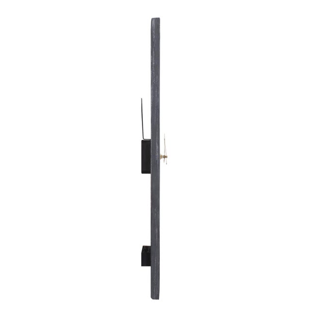 The clock features a sleek, faceless black marble rectangular frame, evoking a sense of modern sophistication. Flowing...