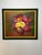 Vintage original framed oil painting depicting a colorful bouquet of stylized flowers in a bronze colored vase. Executed...