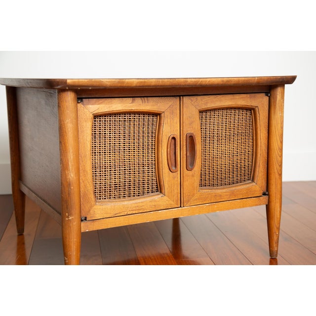 This table is an early example of Lane's Reflection line released in 1964. Featuring American black walnut construction,...