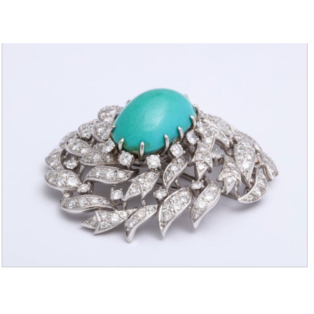 Platinum Asymmetric Dress Clip with Cabochon Turquoise and diamond - Representing Peacock Eye. Tested for platinum...