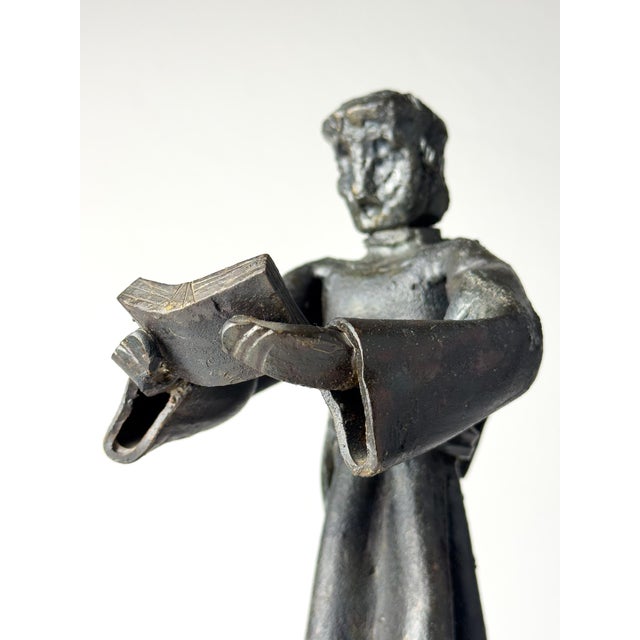 Mid-century modern metal Brutalist sculpture "Monk with The Book" by Salvino Marsura, made in Italy in the 1970s. Salvino...