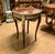 An exquisite French Louis XV style accent table showcasing a beautifully crafted marquetry top, elegant cabriole legs, and...