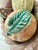 Mexican 1970’s Vintage Monumental Mexican Folk Art Hand-Painted Terracotta Clay Fruit in Braided Oval Bowl, Centerpiece - Set of 6 For Sale - Image 3 of 12
