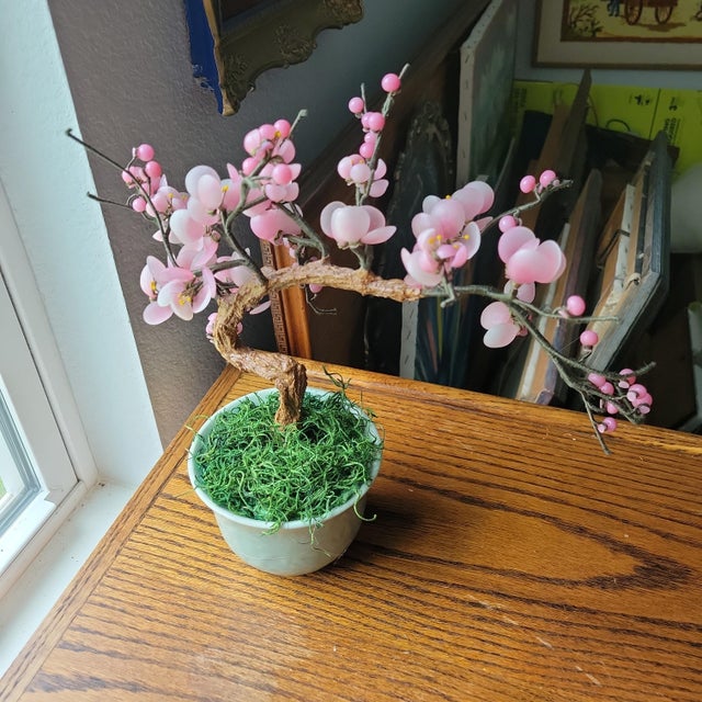 This product is a vintage glass pink cherry blossom flowers leaves bonsai tree, standing at 12 inches tall and 4.5 inches...