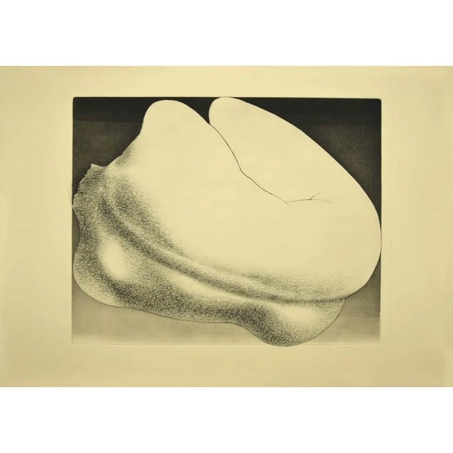 Woman from Shoulders is an original black and white etching on paper, realized by the Italian artist Giacomo Porzano...