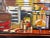 Orange American Diner Still Life Painting by Leading British Urban Landscape Artist For Sale - Image 8 of 13