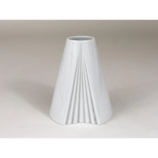 A beautiful white fully glazed cone-shaped porcelain vase Plissee from the 1980s, designed by Ambrogio Pozzi in 1985,...