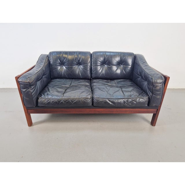 Ingvar Stockum design sofa in black leather, 1960s rare High-quality designer sofa in black leather and solid wood,...