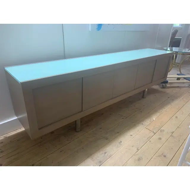 Charlie credenza by Brueton. Utilize the three compartments to easily access your dining, living or foyer goods. It is 19"...