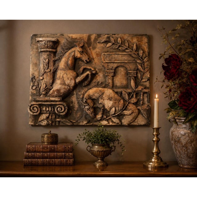 Vintage neoclassical terracotta wall relief plaque featuring deeply molded sculptural equestrian and architectural relief...