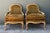 This striking pair of vintage fauteuil chairs offers a masterful blend of French Neoclassical elegance and mid-century...