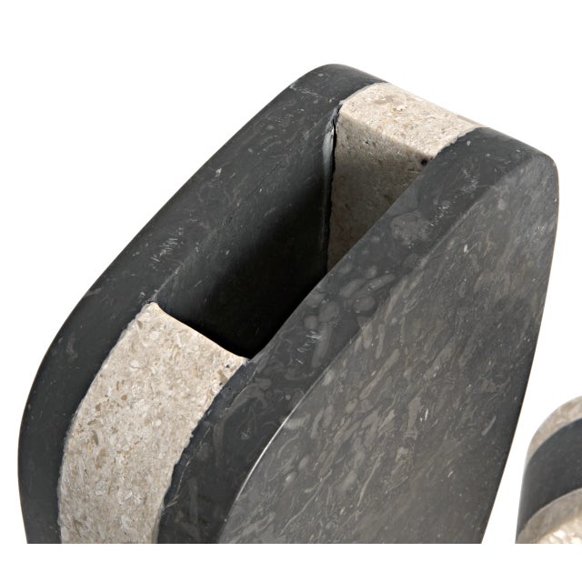 Each vase in the set measures 7 inches in width, 3 inches in depth, and 12 inches in height, making them perfect for...