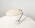 Model 8023 table lamp, designed by Bruno Gatta and produced by Stilnovo around 1960. Crafted from solid white Carrara...