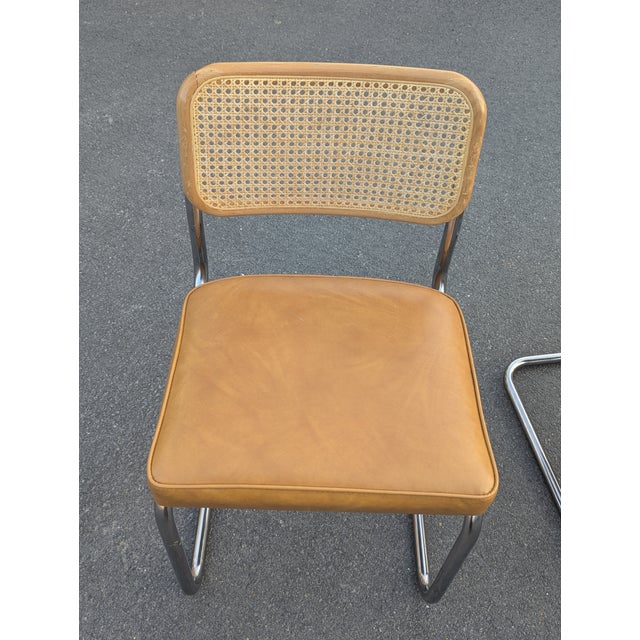 A beautiful set of two Cesca-style cantilever chairs. These pieces define simple mid-century modern design with their...