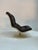 A vintage "Shelby" lounge chair by Georges Van Rijk for Beaufort, 1970s. Cream fibreglass shell with black leather...