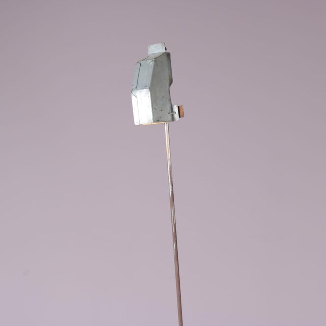 This striking 1990s brutalist floor lamp was designed by Belgian artist and designer Gerard Kuijpers. Combining raw stone...