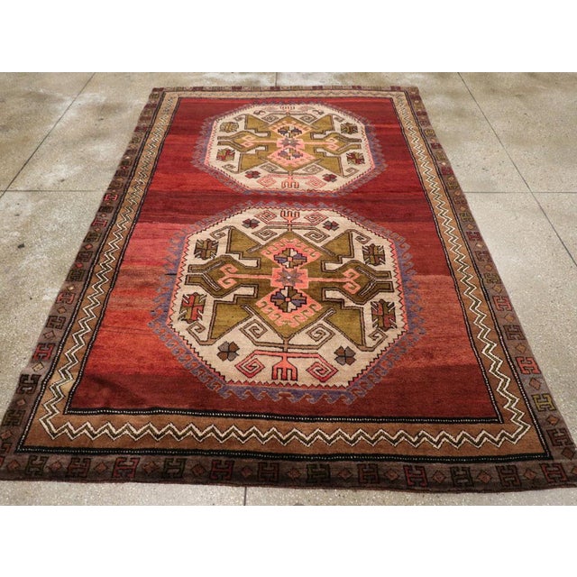 A vintage Turkish Anatolian accent rug handmade during the Mid-20th century. Measures: 6' 5" x 9' 8"