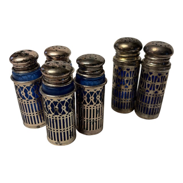 Mid 20th Century Collection of Vintage Cobalt Blue Glass Salt and Pepper Shakers With Silverplate Filigree For Sale