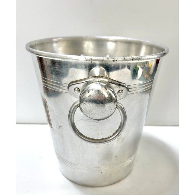 A wonderfully unique champagne ice bucket from 1950s France. The lettering is amazing - it’s so perfectly understated and...