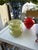 Handblown studio glass vase in a luminous chartreuse green with soft marbled movement through the glass. Sculptural double...