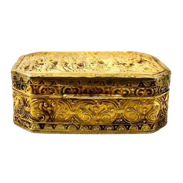 On offer is a miniature gilded box made as an exquisite souvenir of Florence. It depicts a high-relief rendition of one of...