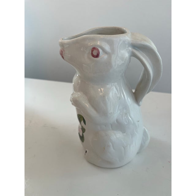 Italian faience rabbit form pitcher. Rabbit ears form the handle. Signed and stamped on bottom.