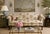 Bring timeless elegance to your space with this beautifully crafted vintage camelback sofa, featuring classic Chippendale-...