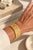An exceptional Italian 18K yellow gold bracelet from circa 1970, designed as three articulated rows of sculptural chevron...
