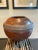 A trio of vessels from the Zulu of South Africa. Burnished clay with beautiful traditional geometric detailing, these are...