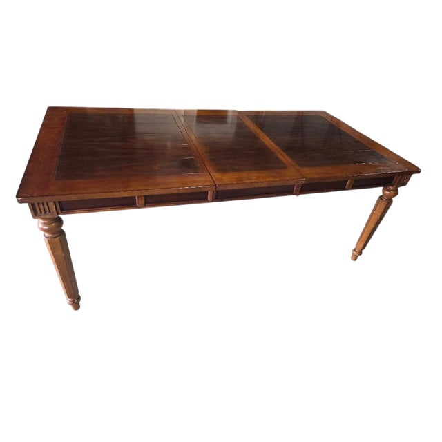 Beautiful traditional 9-piece dining set featuring an expandable rectangular dining table and 8 matching upholstered...