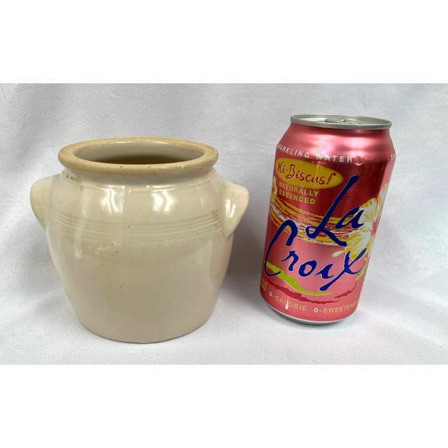 Vintage French confit pot sourced from the Burgundy region. Handcrafted with double handles and simple decorative ridges....