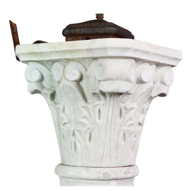 Originally used in a garden and was electrified. Stylized Corinthian capitol with the remains of an old metal switch box,...