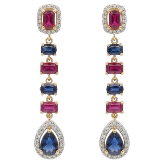 Gemstone details Gold Purity: 14K Solid Gold (stamped) Diamond: 0.31 cts Ruby: blue sapphire: 4.08 cts 14K gold Net...