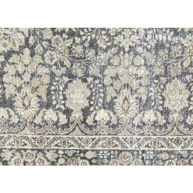 This Semi Antique Persian Tabriz Rug, hand woven in the Tabriz region of Northern Iran, has been distressed and refinished...