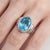 Make a bold and refined statement with this striking Blue Topaz ring, a perfect blend of modern elegance and timeless...