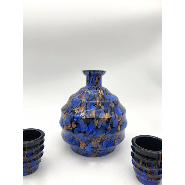 Beautiful coffee set and a Murano carafe consisting of 6 cups and a carafe (tureen) with stirrer also made of glass. Set...