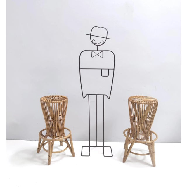 Made in Italy, 1960s - 1970s. These rare stools feature a bamboo frame. They are vintage, therefore they might show slight...