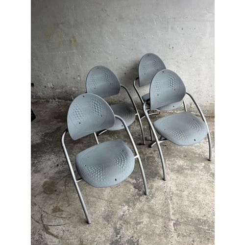 Introduction This set of four Italian chairs by Gazzaro showcases a clear 1980s. with sculptural lines and a functional...