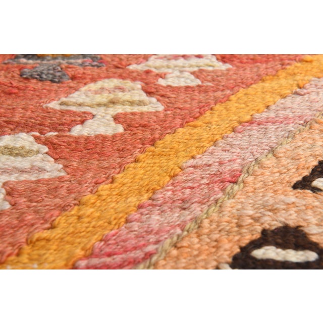 Vintage Hand-Knotted runner rug is a semi-antique vintage area rug. The '70s Eastern region of Anatolia's unique rug is...