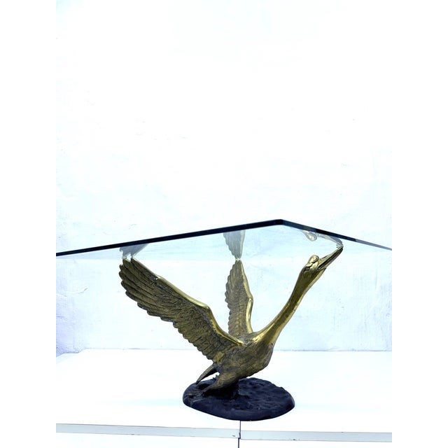 Coffee table base from the 1970s/80s. Brass, non-original removable rectangular glass top (60 x 90 x 1 cm). Good used...