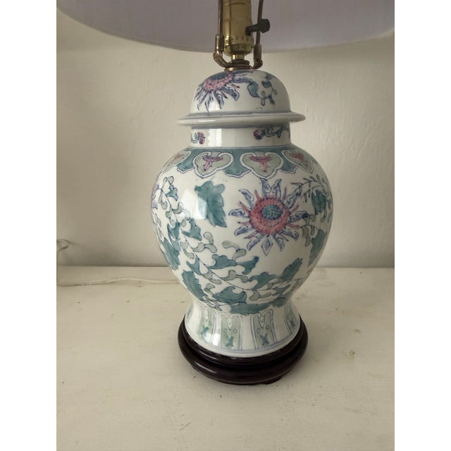 Vintage pastel palette botanical hand painted ginger jar shape table lamp. Lampshade is included. Dimensions: 26”H to...