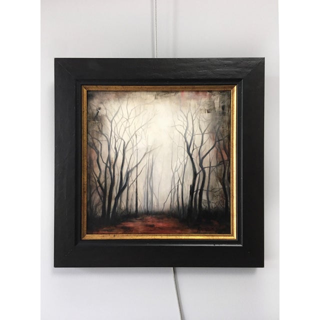 This artwork depicts a hauntingly ethereal landscape, where skeletal trees rise against a fog-laden backdrop, creating a...
