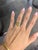 A dramatic 11.78-carat citrine glows in warm golden-yellow at the center of this solid 14K yellow gold statement ring, cut...
