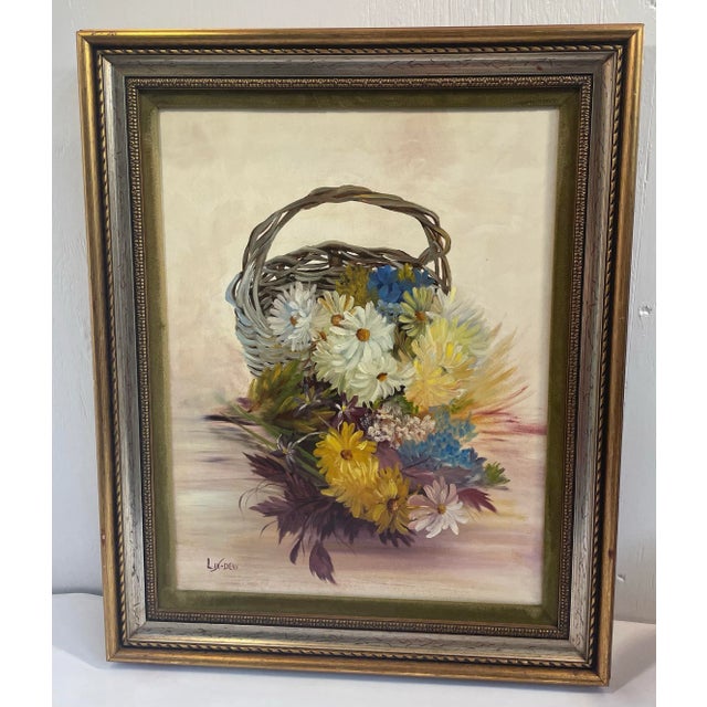 Nice vintage floral still life painting on canvas in nice frame. Signed.