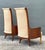 These striking Italian accent chairs are a masterclass in Mid-Century Modern elegance, blending sculptural wood frames...
