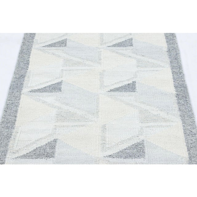 An elegant 3x8 Swedish-style kilim from our award-winning Scandinavian flatweave collection. Handwoven in a premium blend...